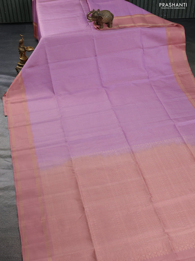 Pure soft silk saree pastel lavender and pastel peach with allover zari checked pattern and rettapet zari woven border