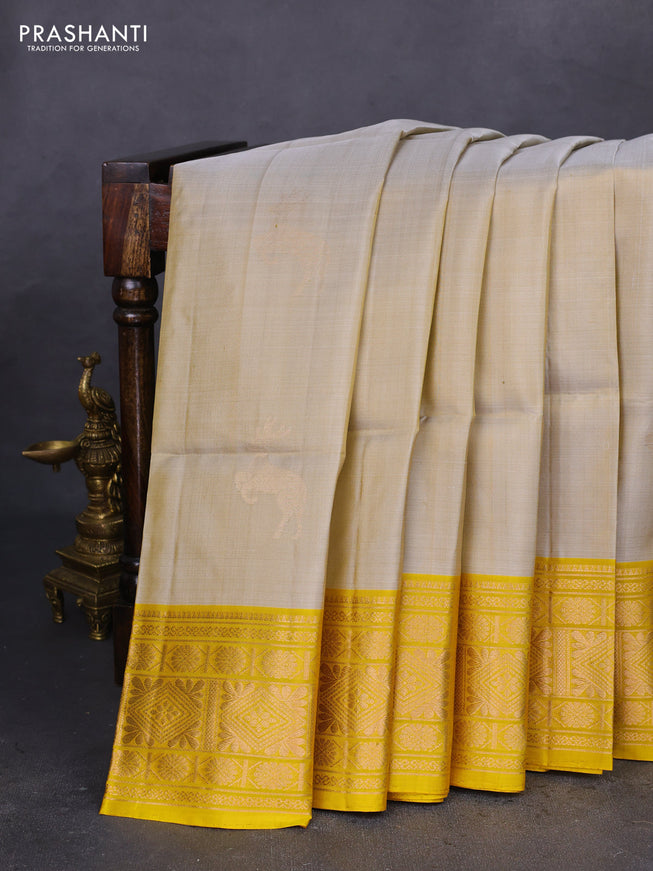 Pure soft silk saree grey shade and yellow with zari woven deer buttas and zari woven border