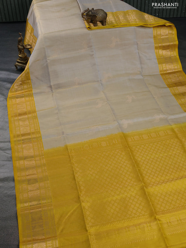 Pure soft silk saree grey shade and yellow with zari woven deer buttas and zari woven border
