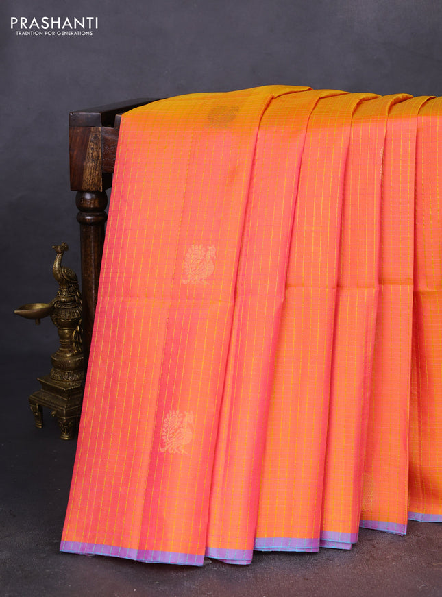 Pure soft silk saree dual shade of pinkish orange with allover checks & annam buttas and piping border