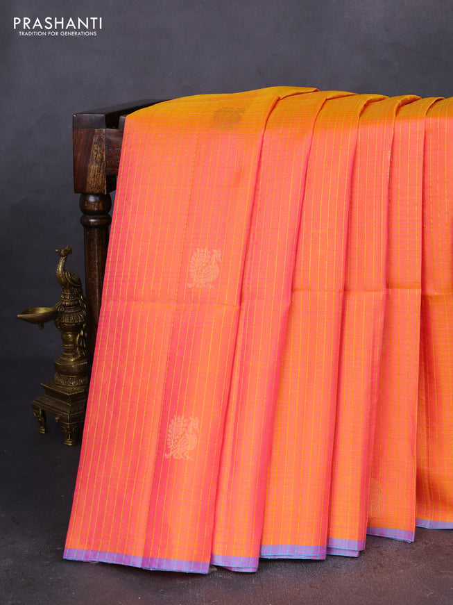 Pure soft silk saree dual shade of pinkish orange with allover checks & annam buttas and piping border