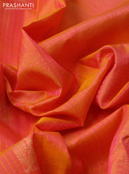 Pure soft silk saree dual shade of pinkish orange with allover checks & annam buttas and piping border