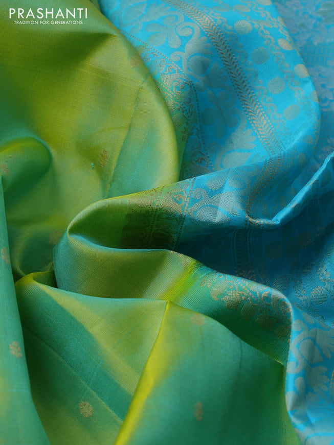 Pure soft silk saree dual shade of green and light blue with zari woven buttas and rettapet zari woven border