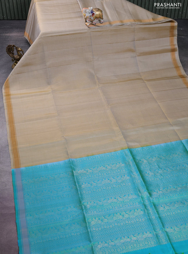 Pure soft silk saree elaichi green and dual shade of teal bluish green with allover zari weaves and zari woven border