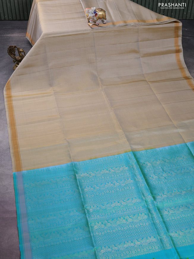 Pure soft silk saree elaichi green and dual shade of teal bluish green with allover zari weaves and zari woven border
