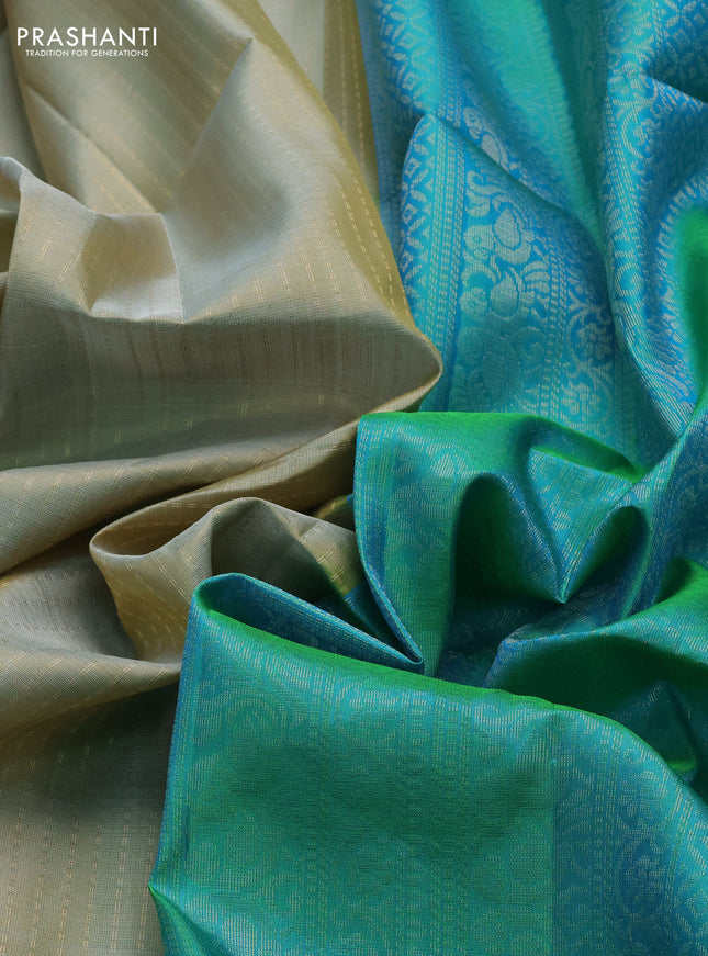 Pure soft silk saree elaichi green and dual shade of teal bluish green with allover zari weaves and zari woven border
