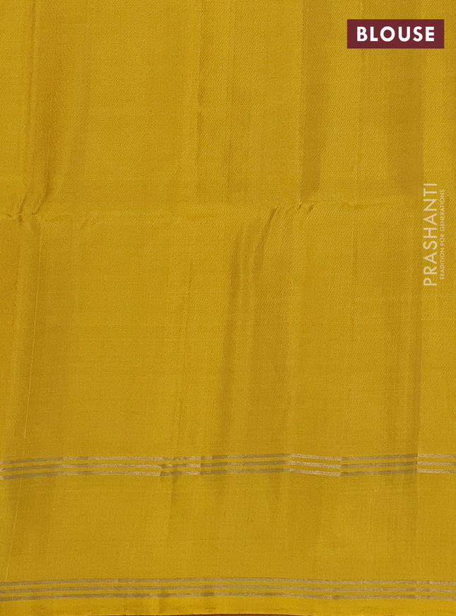 Pure soft silk saree cream and yellow with zari woven floral buttas and rettapet zari woven border
