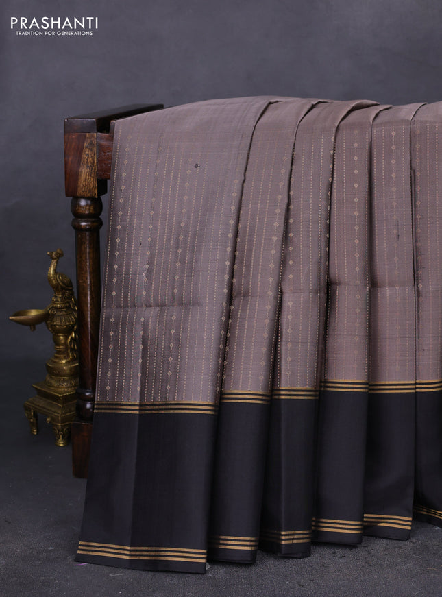 Pure soft silk saree grey and black with allover zari weaves and rettapet zari woven border
