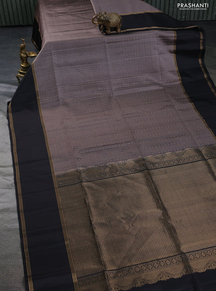 Pure soft silk saree grey and black with allover zari weaves and rettapet zari woven border