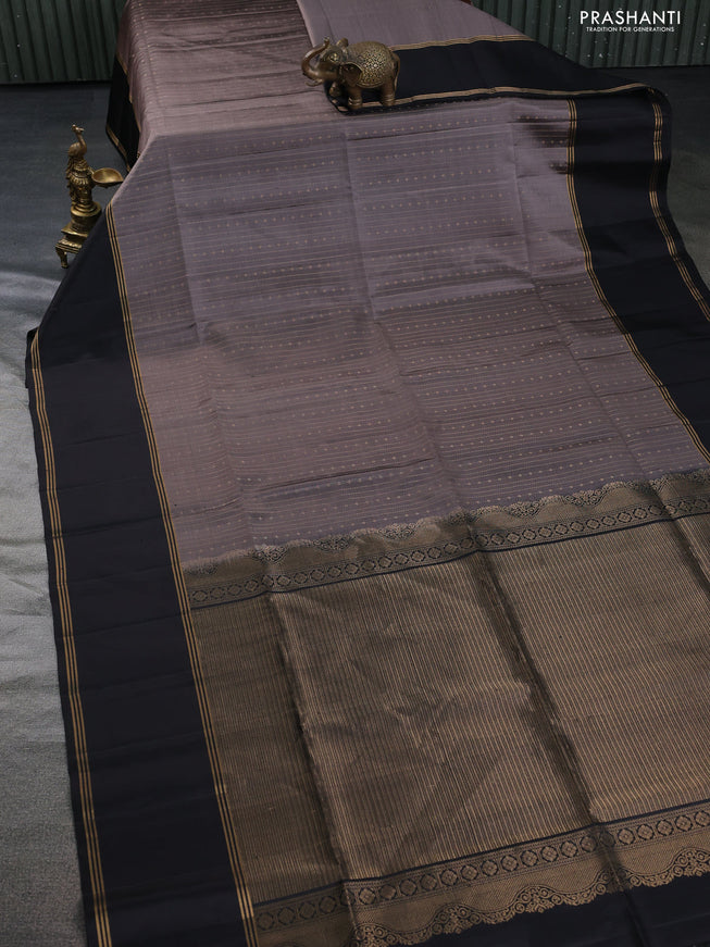 Pure soft silk saree grey and black with allover zari weaves and rettapet zari woven border
