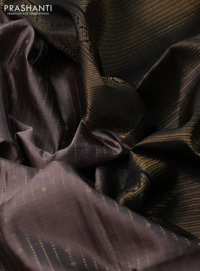 Pure soft silk saree grey and black with allover zari weaves and rettapet zari woven border