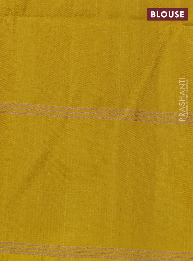 Pure soft silk saree beige and yellow with allover zari weaves and rettapet zari woven border