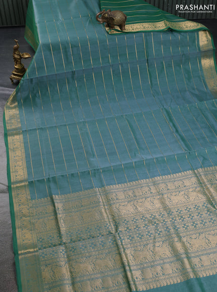 Kanchipuram silk cotton saree green with allover zari stripe pattern and elephant zari woven border