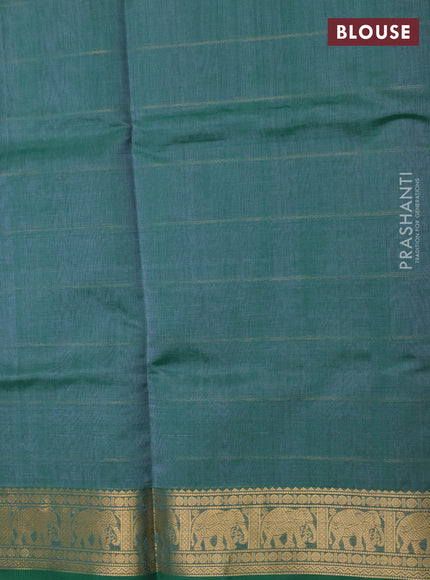Kanchipuram silk cotton saree green with allover zari stripe pattern and elephant zari woven border