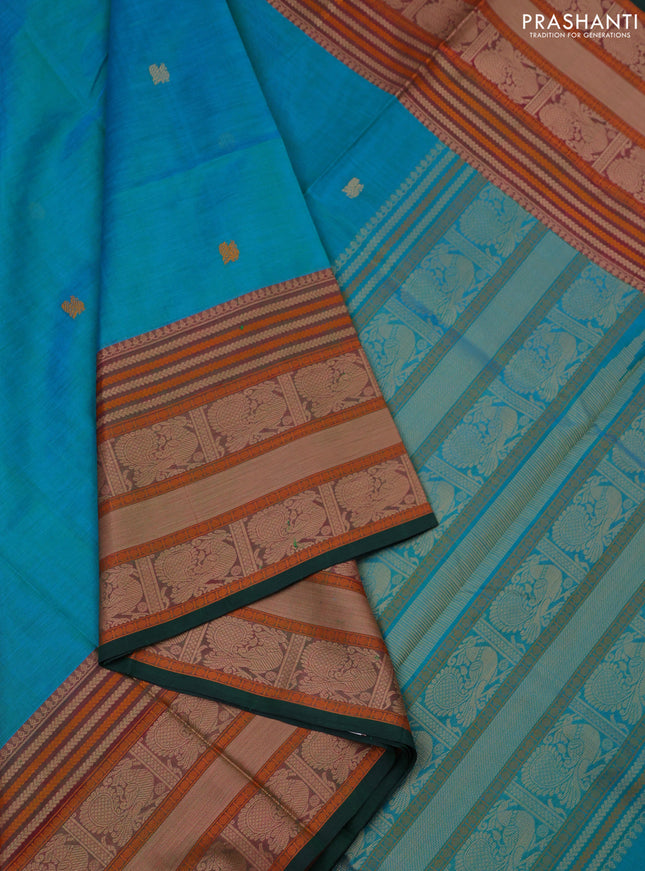 Kanchipuram silk cotton saree dual shade of teal bluish green and green with zari woven buttas and thread woven border