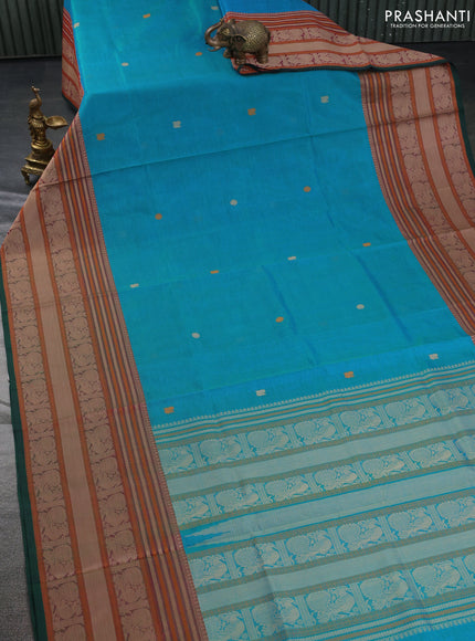 Kanchipuram silk cotton saree dual shade of teal bluish green and green with zari woven buttas and thread woven border