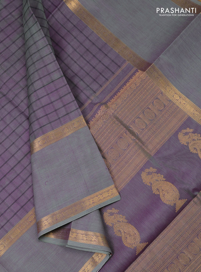 Kanchipuram silk cotton saree dual shade of purple and pastel green with allover thread woven checked pattern and long rettapet zari woven border