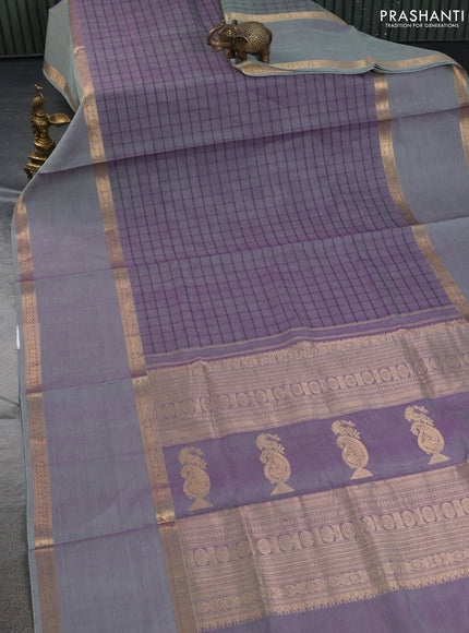Kanchipuram silk cotton saree dual shade of purple and pastel green with allover thread woven checked pattern and long rettapet zari woven border