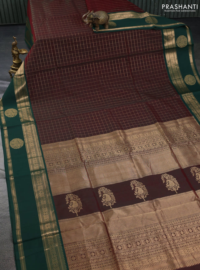 Kanchipuram silk cotton saree dual shade of maroon and green with allover zari checked pattern and zari woven butta border