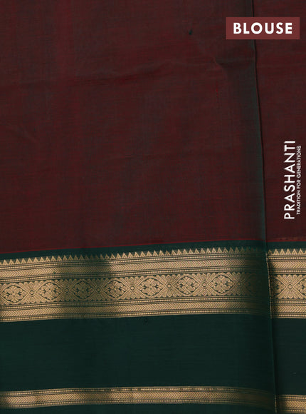 Kanchipuram silk cotton saree dual shade of maroon and green with allover zari checked pattern and zari woven butta border