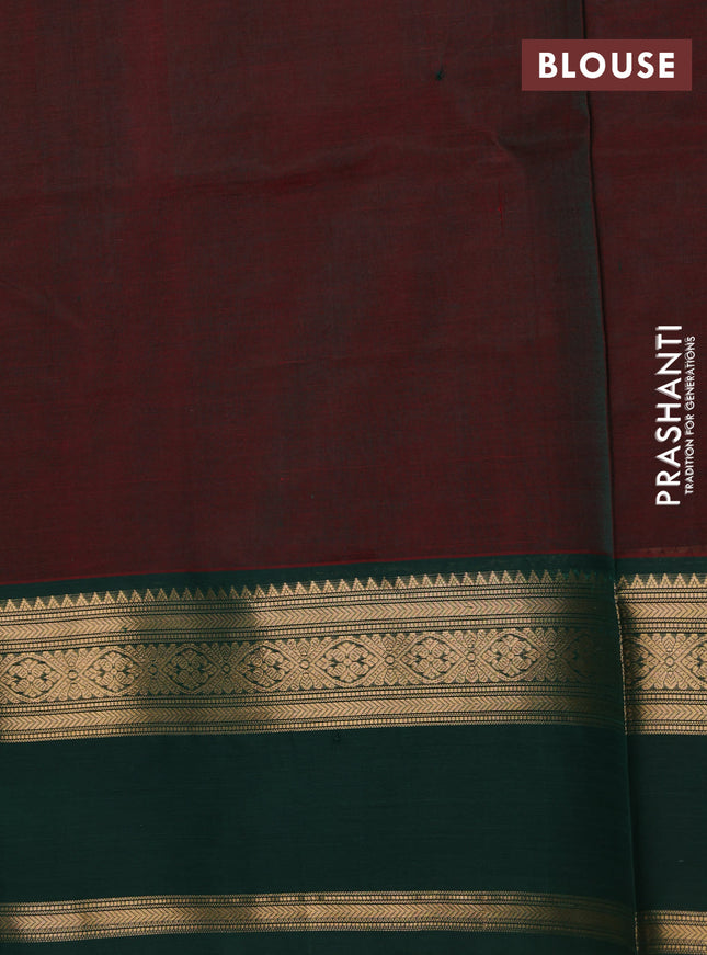 Kanchipuram silk cotton saree dual shade of maroon and green with allover zari checked pattern and zari woven butta border