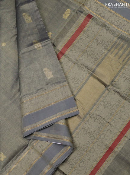 Kanchipuram silk cotton saree grey shade with zari woven buttas and thread woven border