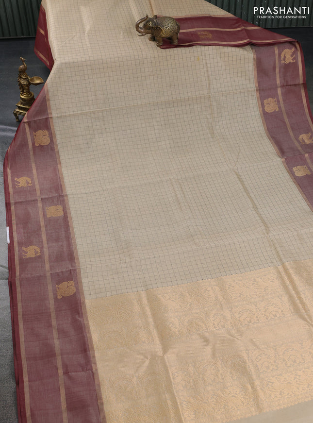 Kanchipuram silk cotton saree sandal and maroon with allover thread checked pattern and rettapet zari woven butta border