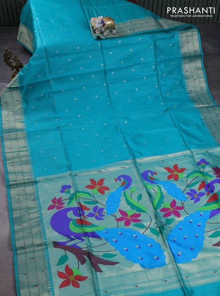Semi paithani saree teal green shade with allover zari woven buttas and peacock design paithani pallu