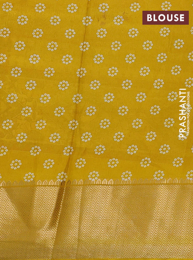 Semi dola saree violet and yellow with allover bandhani prints and long printed zari woven border