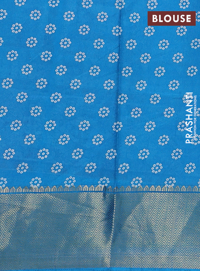 Semi dola saree pink and blue with allover bandhani prints and long printed zari woven border