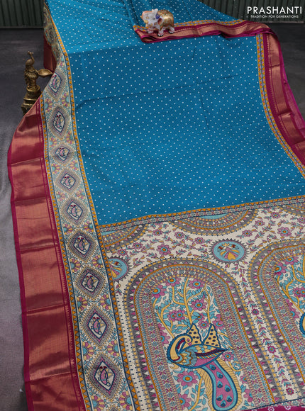 Semi dola saree teal blue shade and dark magenta pink with allover bandhani prints and long printed zari woven border