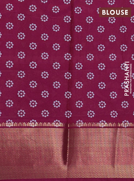 Semi dola saree teal blue shade and dark magenta pink with allover bandhani prints and long printed zari woven border