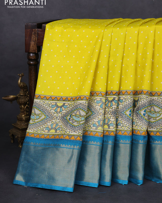 Semi dola saree yellow and teal blue with allover bandhani prints and long printed zari woven border