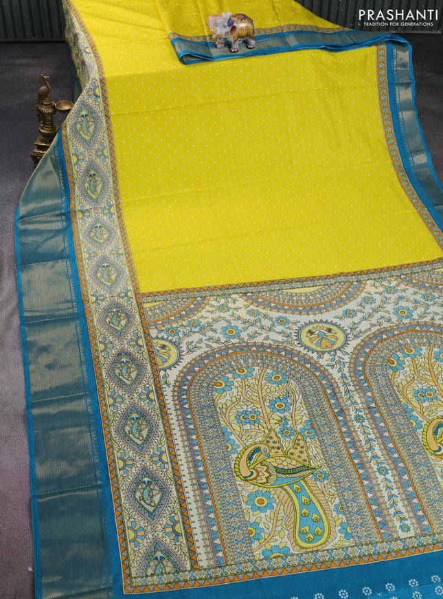 Semi dola saree yellow and teal blue with allover bandhani prints and long printed zari woven border