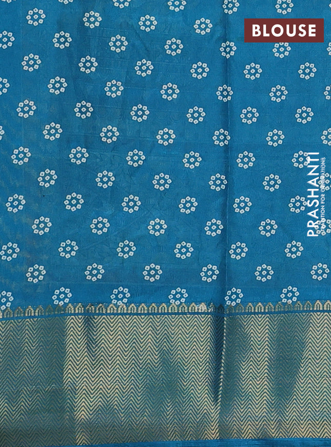 Semi dola saree yellow and teal blue with allover bandhani prints and long printed zari woven border