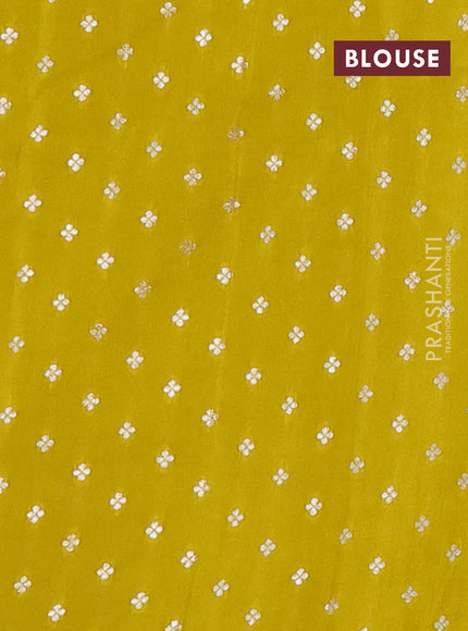 Semi mysore silk saree lime yellow with zari checks & buttas and zari woven border