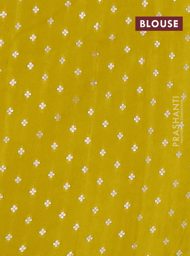 Semi mysore silk saree lime yellow with zari checks & buttas and zari woven border