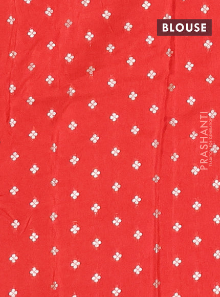 Semi mysore silk saree orange with zari checks & buttas and zari woven border