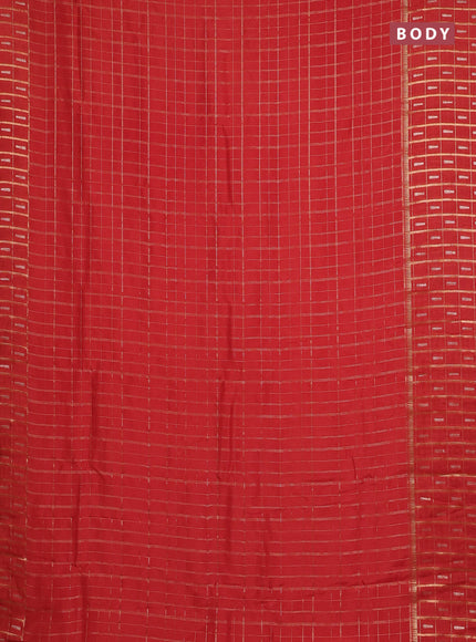 Semi mysore silk saree orange with allover zari checked pattern and zari woven butta border