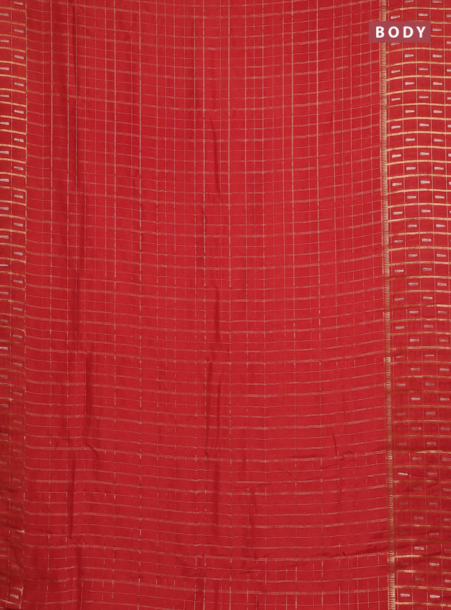 Semi mysore silk saree orange with allover zari checked pattern and zari woven butta border
