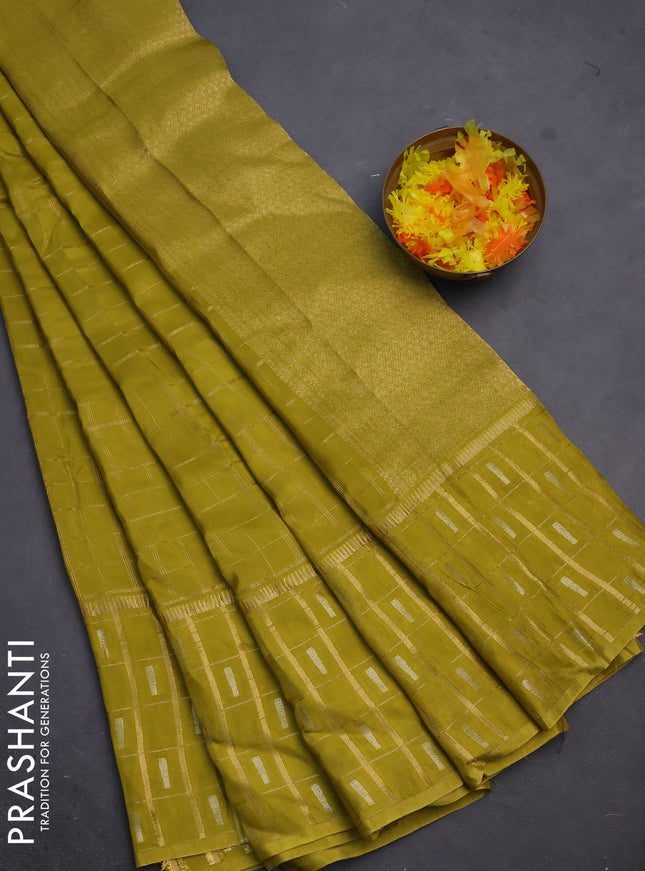 Semi mysore silk saree lime green with allover zari checked pattern and zari woven butta border