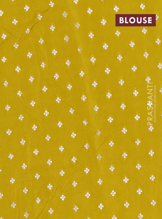 Semi mysore silk saree lime green with allover zari checked pattern and zari woven butta border