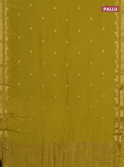 Semi mysore silk saree lime green with zari woven buttas and rettapet zari woven border