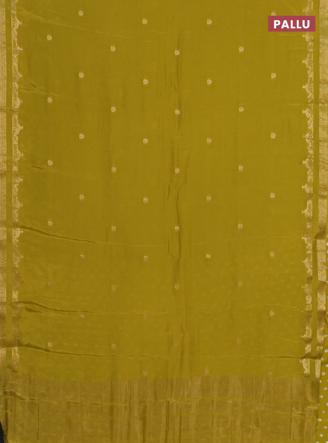 Semi mysore silk saree lime green with zari woven buttas and rettapet zari woven border