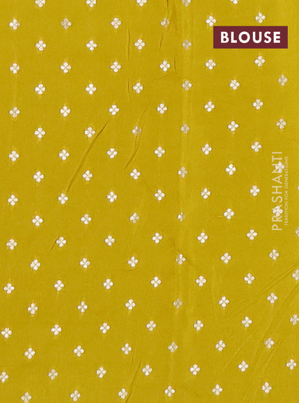 Semi mysore silk saree lime green with zari woven buttas and rettapet zari woven border