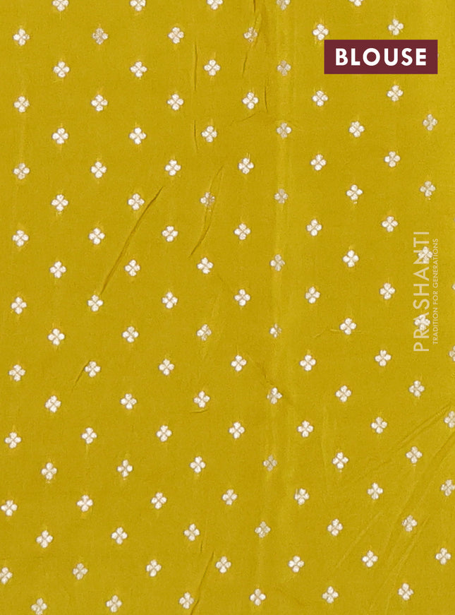 Semi mysore silk saree lime green with zari woven buttas and rettapet zari woven border