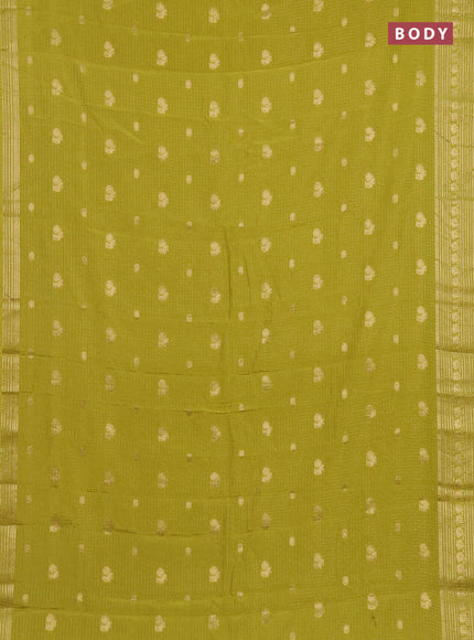 Semi mysore silk saree lime green with allover zari checks & buttas and zari woven border