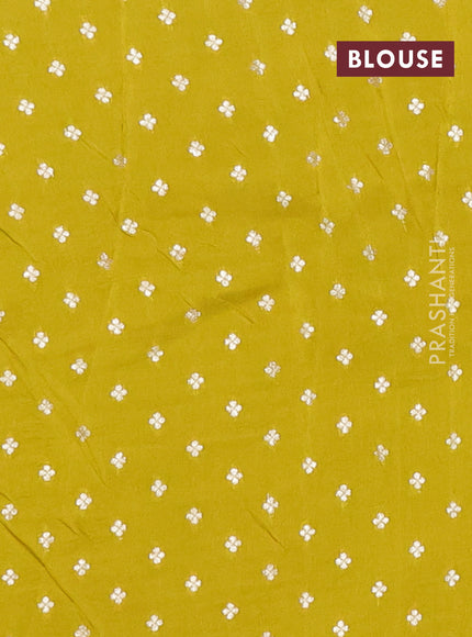 Semi mysore silk saree lime green with allover zari checks & buttas and zari woven border