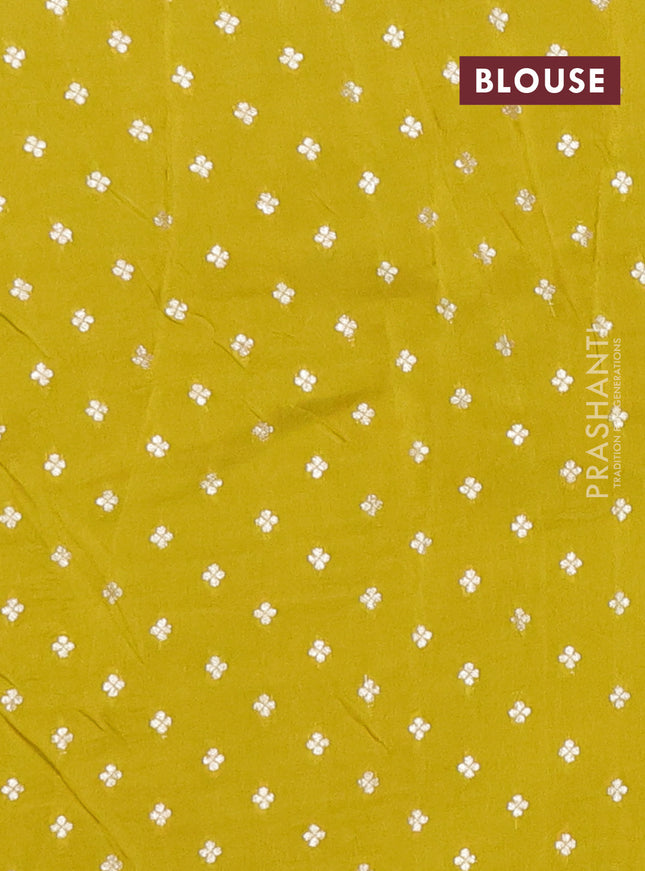 Semi mysore silk saree lime green with allover zari checks & buttas and zari woven border