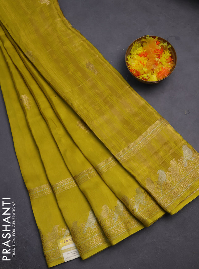 Semi mysore silk saree lime yellow with zari woven floral buttas and long rettapet zari woven border